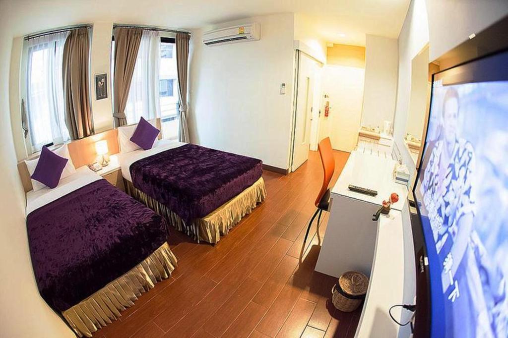 Lido Millennium Hotel Банкок Стая снимка